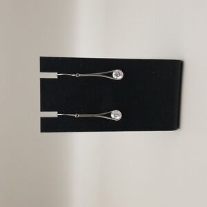 Beautiful silver and cubic zirconia dangle earrings.